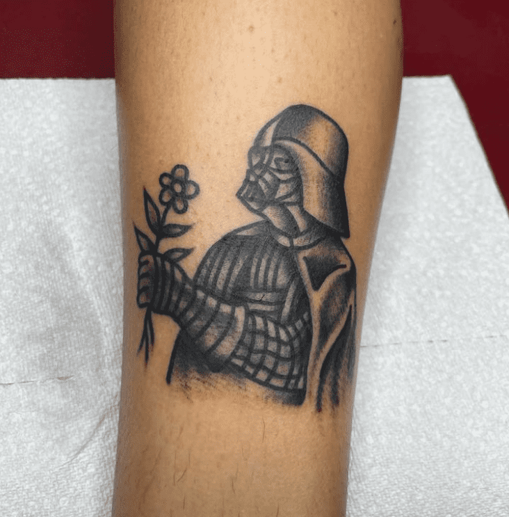 star wars Darth Vader offering a flower tattoo