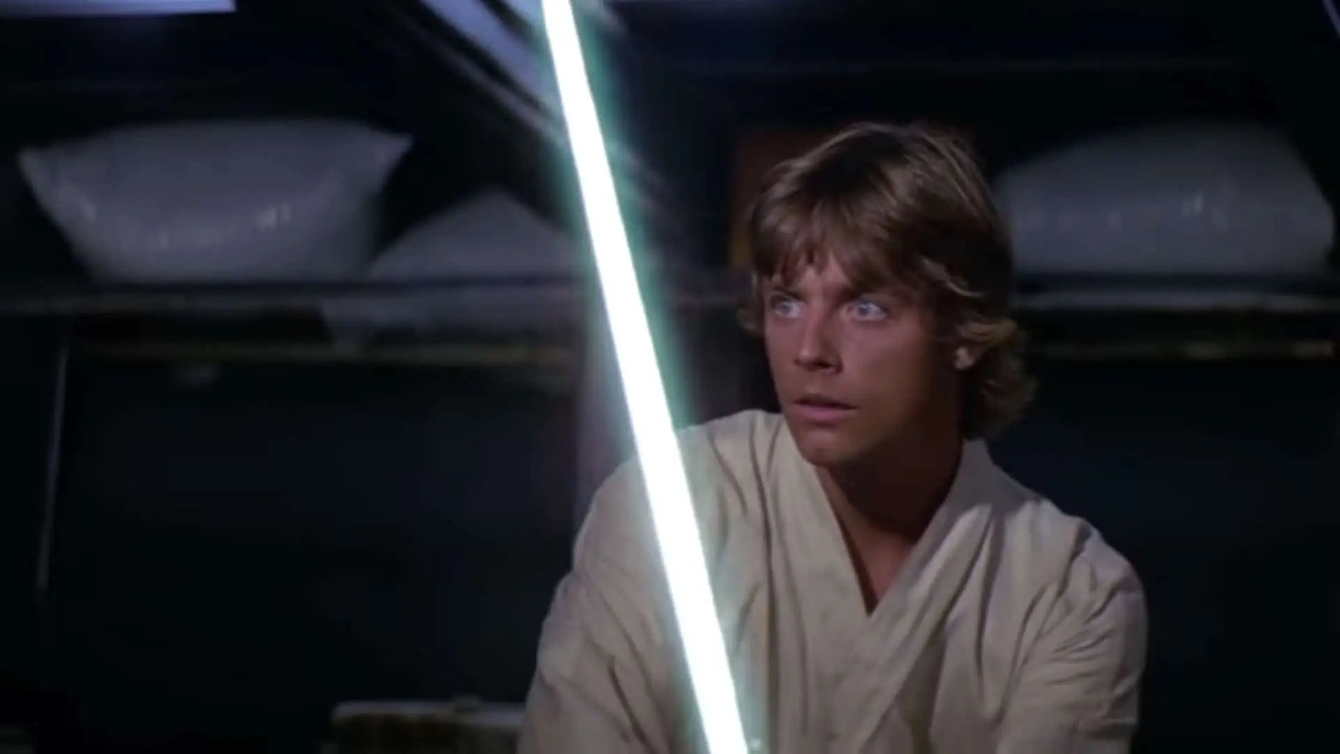 luke holding the lightsaber